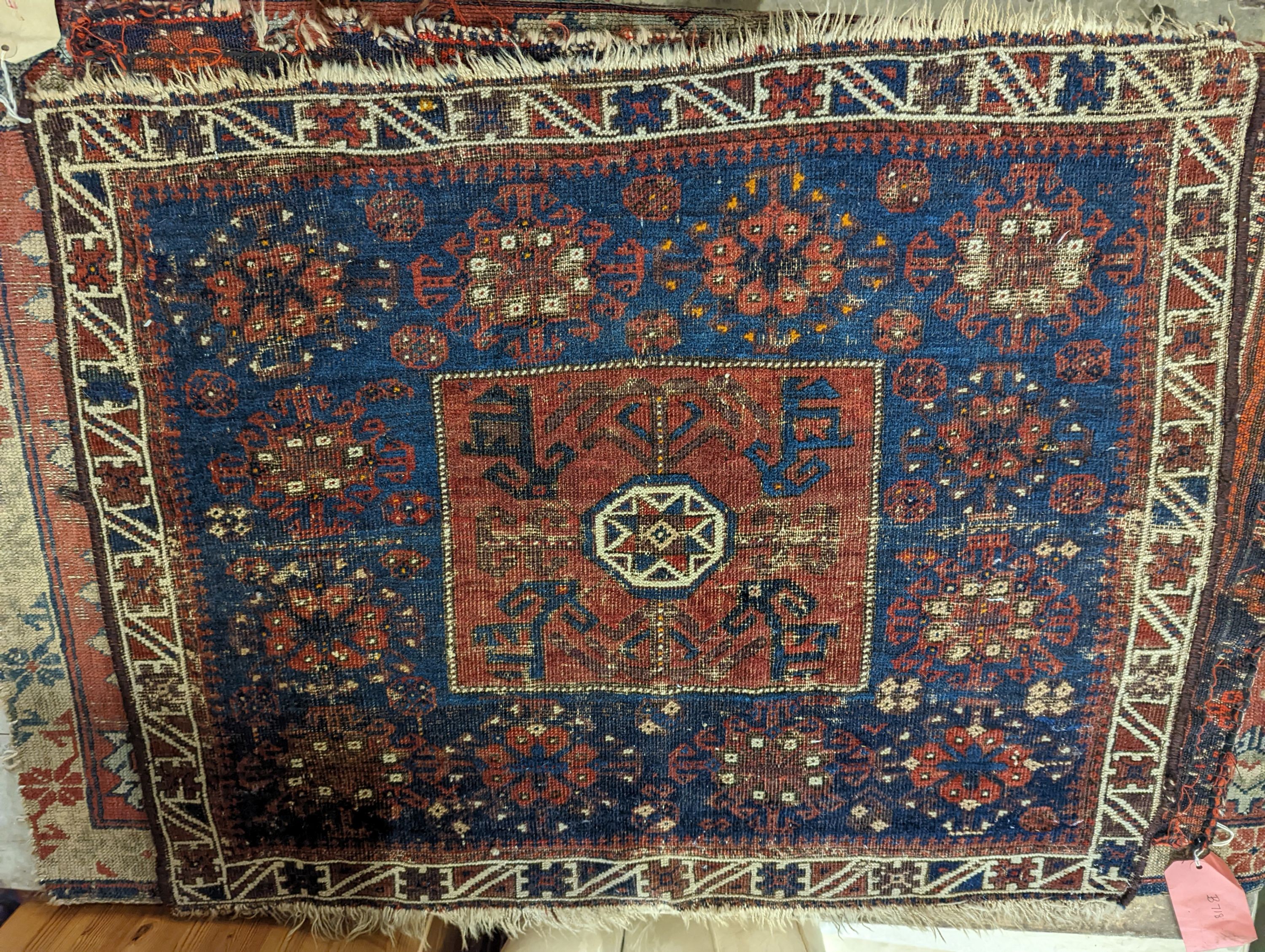 An antique Kuba rug, 118 x 84cm, a Kurdistan bag face, a Belouch bag face and two small rugs